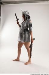 LUCI_AVIOL STANDING POSE WITH TWO GUNS 